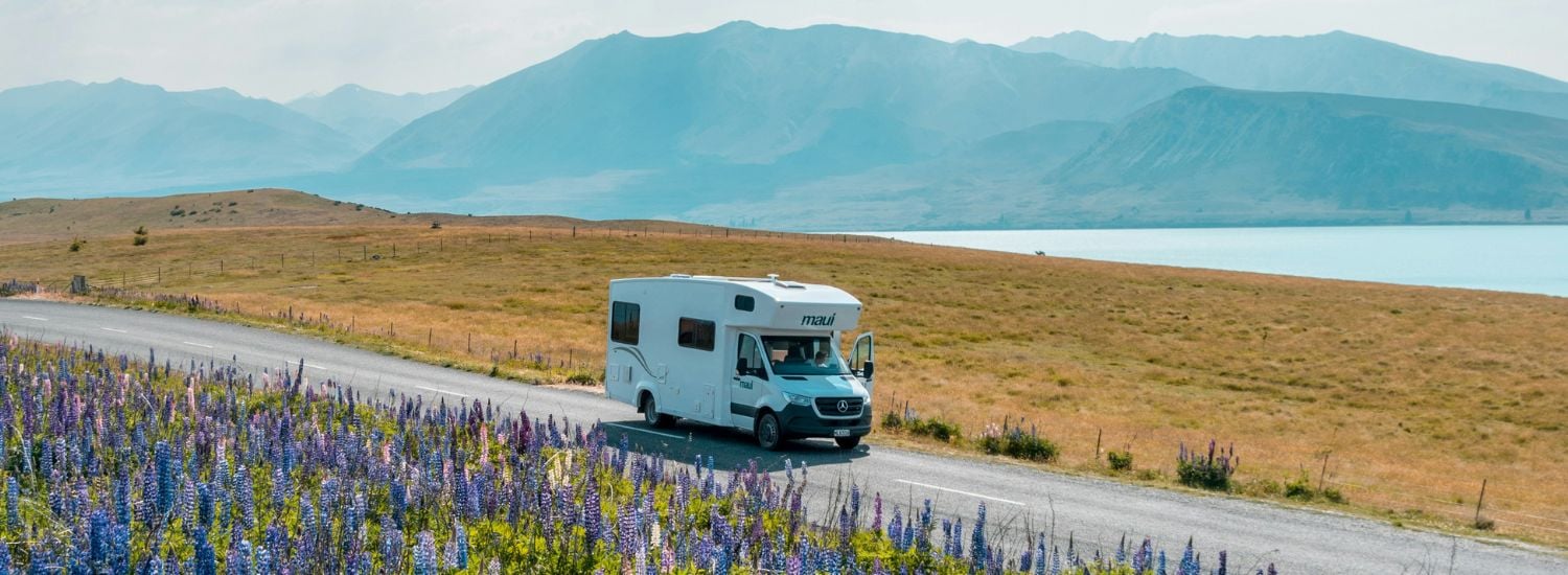 Caravan driving through the mountains in New Zealand