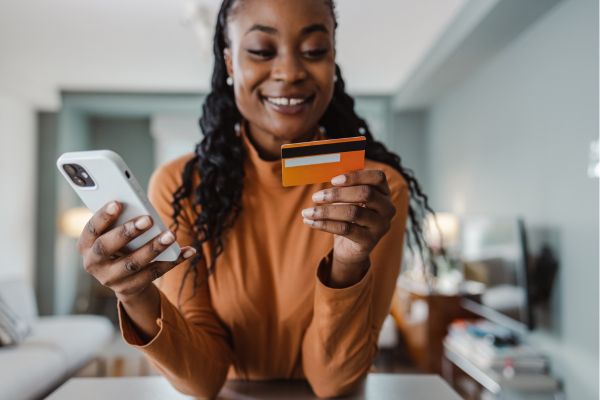 Woman opening a UK bank on her phone