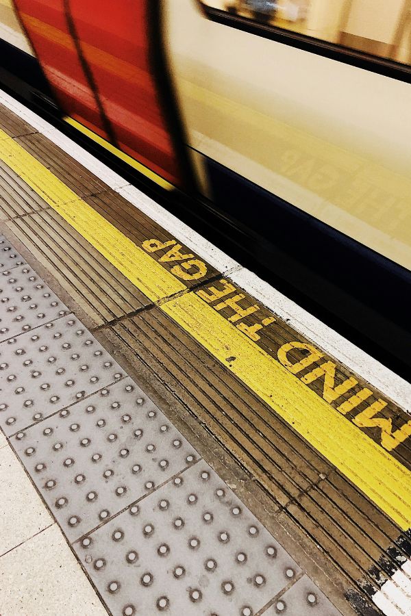 Mind the gap sign in a London tube station