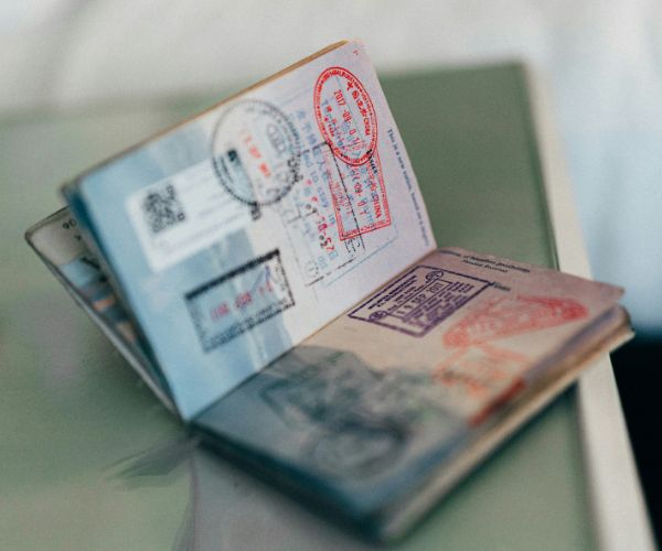 Open passport with visa stamps