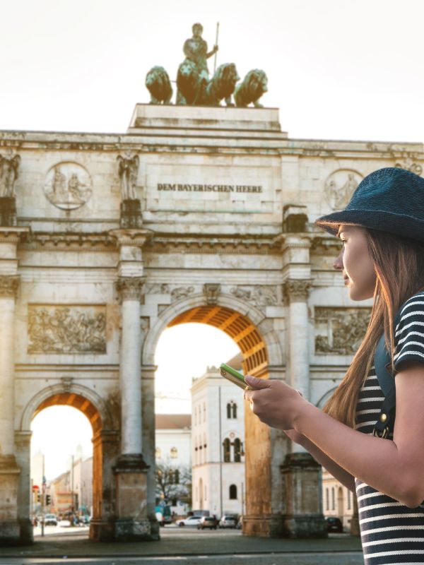 Woman standing by the Brandenburg Gate