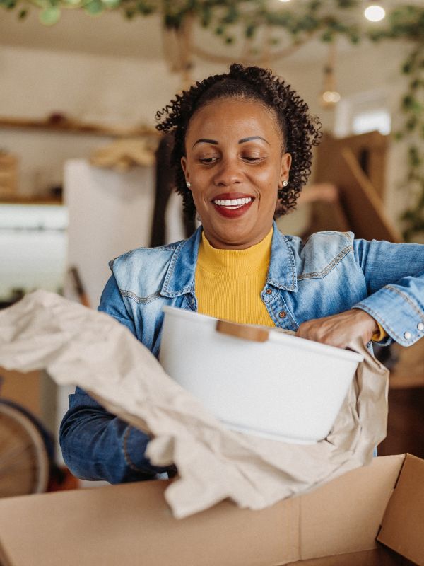 Woman packing a ceramic bowl