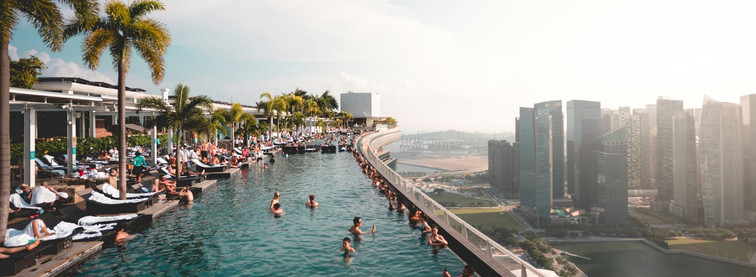 People swimming in an infinity pool in Singapore