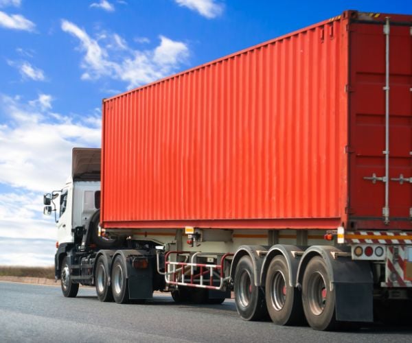 Lorry carrying a container