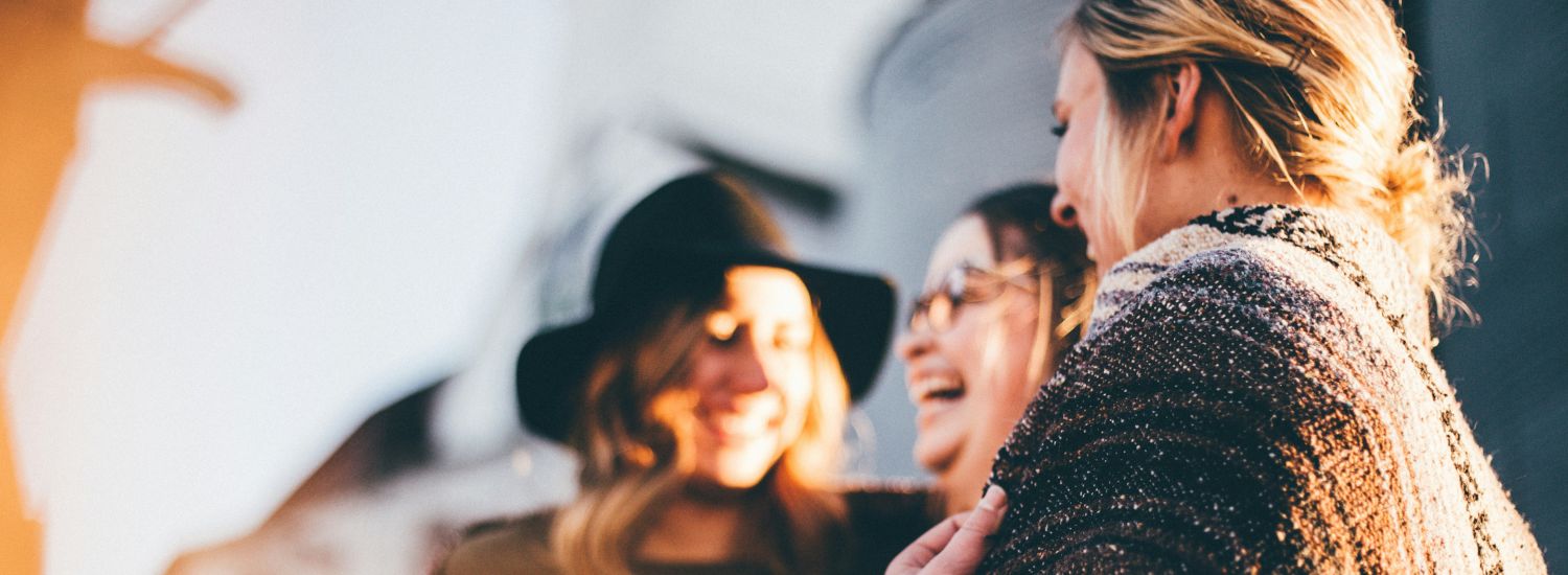 Women laughing and smiling