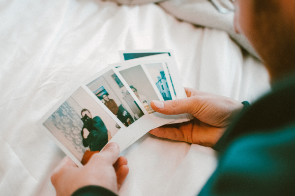 Man sorting through photos