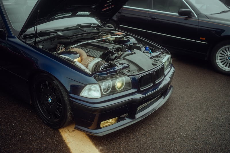 Car with open bonnet