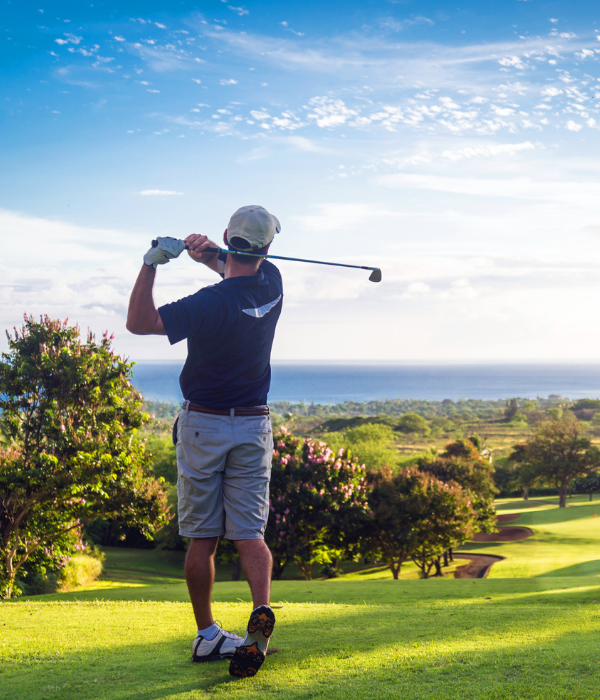 golfer playing on a sunny course