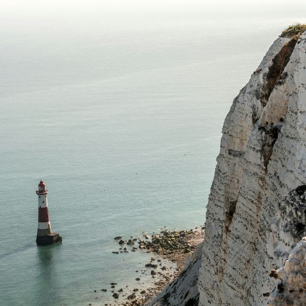 Cliffs of Dover with a lighthouse 