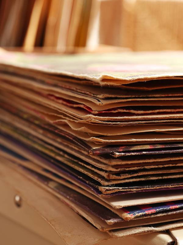 Close up of a stack of vinyl records